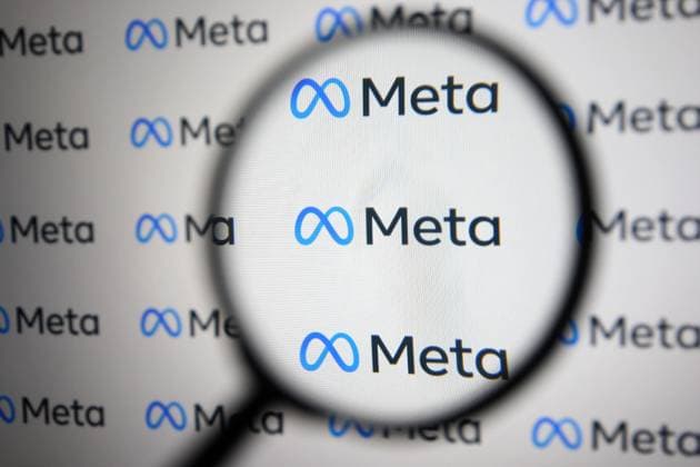 Facebook Renames Itself To Meta Meta Platforms Inc. logo is pictured through a magnifying glass in this illustrative photo taken in Kyiv on 29 October, 2021. Facebook renames itself to new company brand Meta, Chief of Facebook Mark Zuckerberg said on 28 October 2021. Kyiv Ukraine  Copyright: xSTRx sindeyev-notitle211029_npP2c