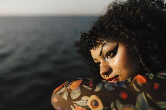 Female teenager with eyeliner day dreaming at pier Sweden, Malmo, model released Copyright: xMaskotx , MA89700