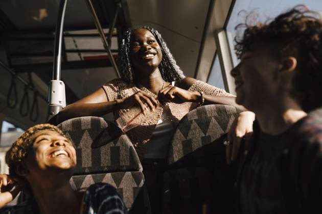 Happy multiracial LGBTQIA friends in bus on sunny day Sweden, Malmo, model released Copyright: xMaskotx , MA89742