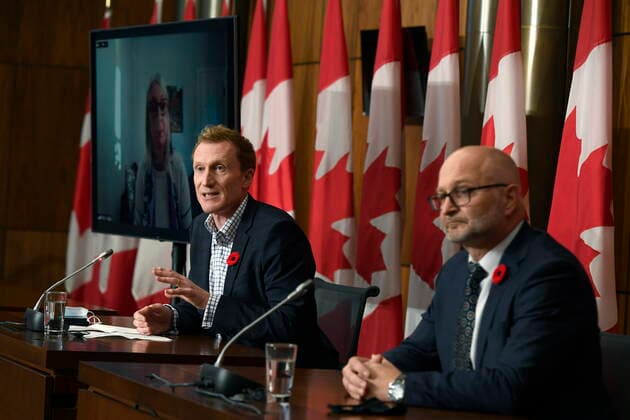 October 29, 2021, Ottawa, ON, CAN: Minister of Crown-Indigenous Relations Marc Miller, centre, Minister of Justice David Lametti and and Minister of Indigenous Services Patty Hajdu, appearing via video conference at left, participate in a news conference regarding the order from the Canadian Human Rights Tribunal to compensate Indigenous children and their families, in Ottawa, on Friday, Oct. 29, 2021. Ottawa CAN  - ZUMAc35_ 20211029_zaf_c35_146 Copyright: xJustinxTangx
