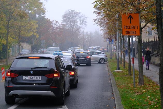 Croatia on a peak of 4th COVID-19 wave Cars wait in line at Andrija Stampar Teaching Institute of Public Health COVID-19 drive-through testing in Zagreb, Croatia on October 30, 2021. The director of the Croatian Institute of Public Health, Krunoslav Capak hopes that Croatia is on a peak of 4th COVID-19 wave. SlavenxBranislavxBabic PIXSELL