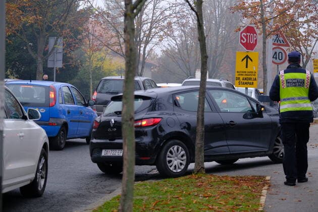 Croatia on a peak of 4th COVID-19 wave Cars wait in line at Andrija Stampar Teaching Institute of Public Health COVID-19 drive-through testing in Zagreb, Croatia on October 30, 2021. The director of the Croatian Institute of Public Health, Krunoslav Capak hopes that Croatia is on a peak of 4th COVID-19 wave. SlavenxBranislavxBabic PIXSELL
