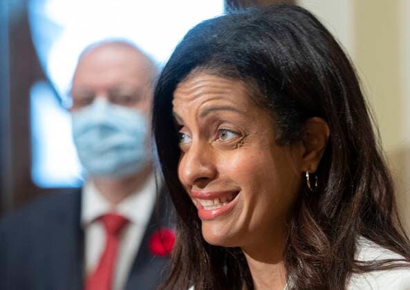 November 2, 2021, QUEBEC, PQ, Canada: Quebec Liberal Leader Dominique Anglade responds to reporters questions over the dismissal of MNA Marie Montpetit from the Liberal caucus, Tuesday, November 2, 2021 at the legislature in Quebec City. Caucus president Pierre Arcand, left, looks on. QUEBEC Canada  - ZUMAc35_ 20211102_zaf_c35_019 Copyright: xJacquesxBoissinotx