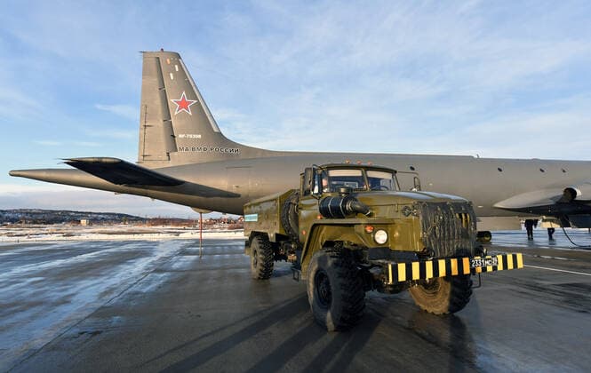 MURMANSK REGION, RUSSIA â€“ NOVEMBER 2, 2021: Fuelling an Ilyushin Il-38 anti-submarine warfare aircraft of Russia s Northern Fleet naval aviation up with oxygen at the Severomorsk-1 naval air base. The Northern Fleet produces oxygen for naval aviation at oxygen producing stations . The Northern Fleet supplies liquefied oxygen to hospitals for COVID-19 patients where there is oxygen shortage. The Northern Fleet has enough oxygen to supply its naval aviation and to help civilian healthcare workers. Lev Fedoseyev TASS  TS116967