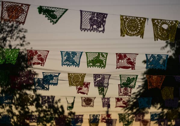 Day Of The Dead In Playa Del Carmen The papel picado (perforated paper) decorations related to the Day of the Dead (in Spanish: Dia de Muertos) in the municipal cemetery of Playa del Carmen. All Saints Day in Mexico coincides with the first day of the Day of the Dead (Dia de Muertos) celebration. It commemorates children who have died (Dia de los Inocentes) and the second day celebrates all deceased adults. In 2008, the tradition was inscribed in the Representative List of the Intangible Cultural Heritage of Humanity by UNESCO. On Tuesday, 2 November 2021, in Playa Del Carmen, Quintana Roo, Mexico. Playa Del Carmen Mexico  Copyright: xArturxWidakx widak-dayofthe211102_npidd