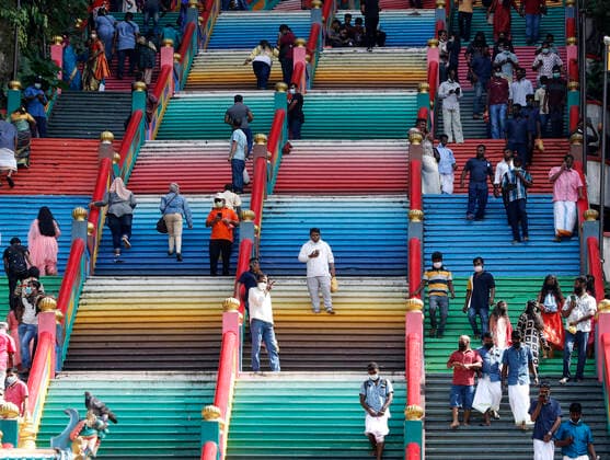 November 4, 2021, Kuala Lumpur, Malaysia: Hindu devotees seen walking on the coloured stairs after offering prayers at the Batu Caves temple during the festival..Diwali is one of the major religious festivals in Hinduism. The Goddess Lakshmi, the god of wealth is worshiped during Diwali for happiness, prosperity, and fame. Kuala Lumpur Malaysia - ZUMAs197 20211104_zaa_s197_588 Copyright: xWongxFokxLoyx
