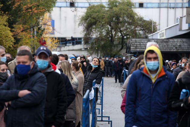 Lnes for the coronavirus vaccination at the Zagreb Fair Citizens are seen waiting in lines at the Zagreb Fair for vaccination with the 1st and 2nd dose of the vaccine. The official confirmation of the headquarters has arrived that today is the day with the most deaths from coronavirus, as well as the largest number of infected people since the beginning of the pandemic. In the last 24 hours, 7,094 new cases of SARS-CoV-2 virus infection were recorded, and the number of active cases in Croatia today is a total of 31,689. Among them, 1,786 patients are in hospital treatment, of which 234 patients are on respirators., in Zagreb, Croatia, on November 06, 2021. ZeljkoxHladika PIXSELL