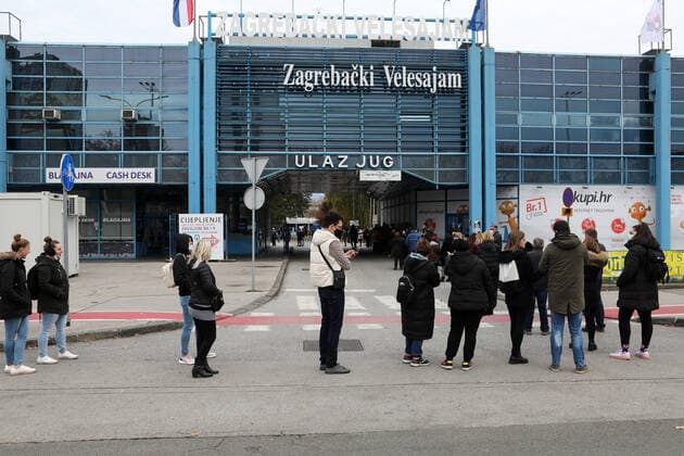 Lnes for the coronavirus vaccination at the Zagreb Fair Citizens are seen waiting in lines at the Zagreb Fair for vaccination with the 1st and 2nd dose of the vaccine. The official confirmation of the headquarters has arrived that today is the day with the most deaths from coronavirus, as well as the largest number of infected people since the beginning of the pandemic. In the last 24 hours, 7,094 new cases of SARS-CoV-2 virus infection were recorded, and the number of active cases in Croatia today is a total of 31,689. Among them, 1,786 patients are in hospital treatment, of which 234 patients are on respirators., in Zagreb, Croatia, on November 06, 2021. ZeljkoxHladika PIXSELL