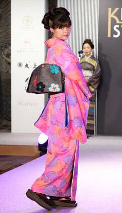 November 9, 2021, Tokyo, Japan - Japanese tiktoker Hina Kagei displays kimono as she receives the first Kimonoist award for the promotion of Japanese traditional dresses in Tokyo on Tuesday, November 9 2021.  (173989340)