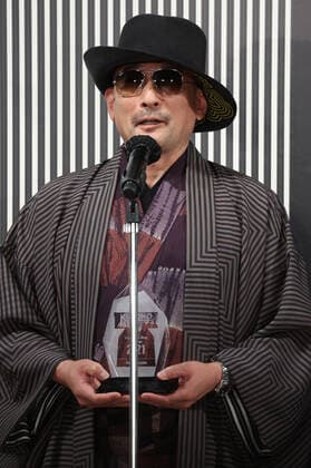 November 9, 2021, Tokyo, Japan - Japanese musician Ken Yokoyama displays kimono as he receives the first Kimonoist award for the promotion of Japanese traditional dresses in Tokyo on Tuesday, November 9 2021.  (173989354)