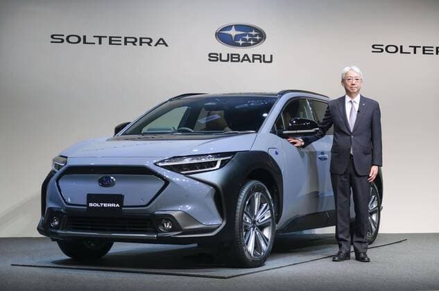 Subaru unveils its first EV to be sold globally Subaru Corp. President and CEO Tomomi Nakamura stands next to the Solterra sport utility vehicle, the automaker s first all-electric vehicle to be sold globally, during an unveiling event in Tokyo on Nov. 11, 2021.  A14AA0000923243P