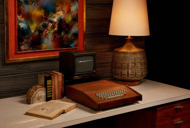 **VIDEO AVAILABLE. CONTACT INFO@COVERMG.COM TO RECEIVE.** An original Apple computer built by firm co-founders Steve Wozniak and Steve Jobs in 1976 has fetched $500,000 (Â£373,326) at auction in the US. The rare Hawaiian koa wood-cased Apple-1 - still functioning - is one of only 200 made and sold in kit form. The computer has only had two owners, a college professor and his student to whom he sold the machine for $650, said John Moran Auctioneers in California. The sale included user manuals and Apple software on two cassette tapes. This is kind of the holy grail for vintage electronics and computer tech collectors, Apple-1 expert Corey Cohen told the Los Angeles Times ahead of Tuesday s auction in the city of Monrovia, near Los Ang Copyright: xx 50874906 EDITORIAL USE ONLY. NOT FOR USE BY NEWSPAPERS BASED IN THE UK.