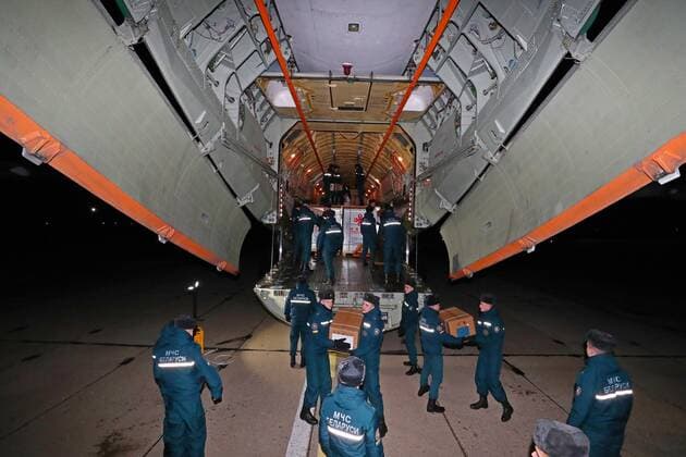 (211112) -- MINSK, Nov. 12, 2021 -- Chinese vaccines and medical supplies are unloaded from a plane at an airport in Minsk, Belarus, Nov. 11, 2021. China and Belarus signed a document on vaccine transfer after a new batch of coronavirus vaccines from China arrived here Thursday. (Photo by Xinhua) BELARUS-MINSK-COVID-19-CHINA-VACCINE HenadzxZhinkov 