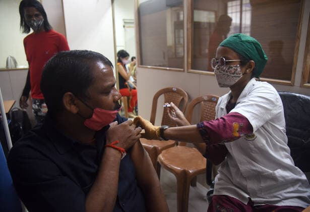 MUMBAI, INDIA - NOVEMBER 11: Beneficiaries get inoculated against Covid-19 at Maratha Mandir s Babasaheb Gawde Hospital, Vile Parle, on November 11, 2021 in Mumbai, India. (Photo by Vijay Bate Hindustan Times ) Daily Life Amid Coronavirus Pandemic In India