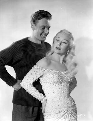 MAD ABOUT MEN BR 1954 MAD ABOUT MEN BR 1954 DONALD SINDEN, GLYNIS JOHNS Date: 1954. Strictly editorial use only in conjunction with the promotion of the film. Credit line mandatory. This image is copyright of the film company and is supplied under the terms of issue as film still. No commercial or book cover use permitted without prior consent from the film company.  Mandatory credit line: Courtesy Ronald Grant Mary Evans