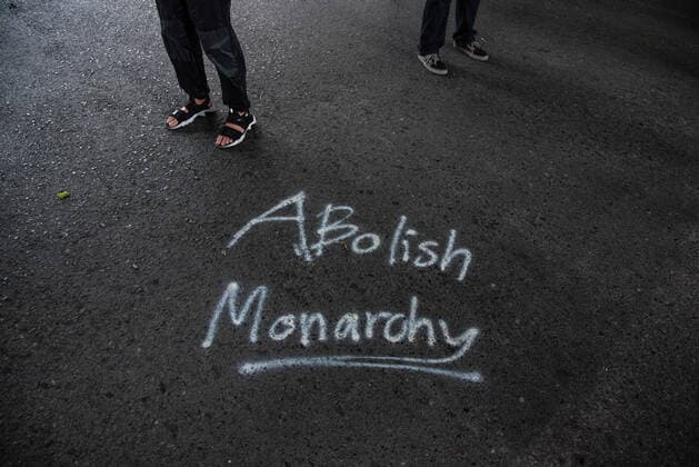 November 14, 2021, Bangkok, Thailand: A message reading Abolish Monarchy seen written on the road during the demonstration. .Pro democracy protesters gathered at Pathum Wan Intersection demanding to reform the monarchy after the Constitutional Court ruled that three protest leaders (Anon Nampa, Panusaya Rung Sithijirawattanakul, Panupong Mike Jadnok) aimed to overthrow the monarchy during their mass rally calling for political and monarchy reform in Thailand. Bangkok Thailand - ZUMAs197 20211114_zaa_s197_059 Copyright: xPeeraponxBoonyakiatx