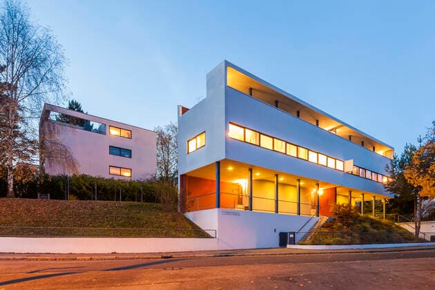 Germany, Stuttgart, Weissenhof Estate, Citrohan House and lighted Weissenhof Museum at twilight, WD03806