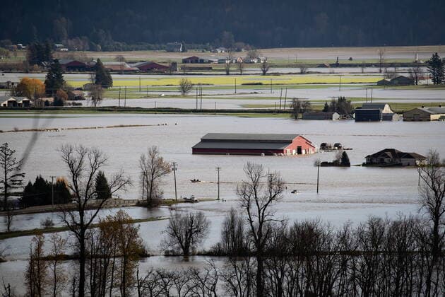 November 16, 2021, ABBOTSFORD, BC, CANADA: A boat travels across flooded farmland in Abbotsford, B.C., on Tuesday, November 16, 2021. ABBOTSFORD CANADA  - ZUMAc35_ 20211116_zaf_c35_071 Copyright: xDarrylxDyckx