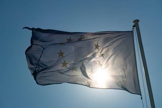 EU Flag In Greece Flag of Europe waving in the blue sky during a sunny day in the Greek island of Samos. The European Flag is the symbol of Council of Europe COE and the European Union EU. Samos island, Greece on September 22, 2021 Samos Samos Island Greece  Copyright: xNicolasxEconomoux economou-notitle210922_npTY5