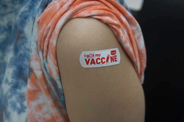 Thailand: Nonthaburi booster Pfizer dose 3rd The doctor has given the vaccinated person a medicinal plaster with written vaccination. Nonthaburi Nonthaburi Thailand Copyright: AtiwatxSilpamethanont