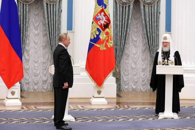 MOSCOW, RUSSIA - NOVEMBER 20, 2021: Russia s President Vladimir Putin (L) presents the Andrew the First-Called Order to Patriarch Kirill of Moscow and All-Russia at Moscow s Kremlin. Mikhail Metzel POOL TASS  TS118954
