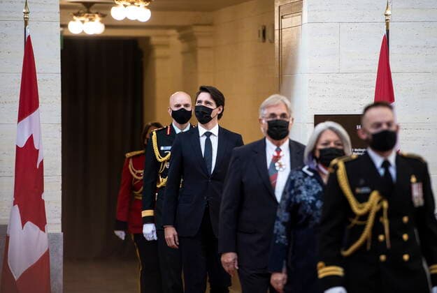 November 23, 2021, Ottawa, ON, CAN: Prime Minister Justin Trudeau looks up as he walks with Gov. Gen. Mary Simon, second from right, as they arrive for the Speech from the Throne at the Senate of Canada building in Ottawa, on Tuesday, Nov. 23, 2021. Ottawa CAN  - ZUMAc35_ 20211123_zaf_c35_035 Copyright: xJustinxTangx