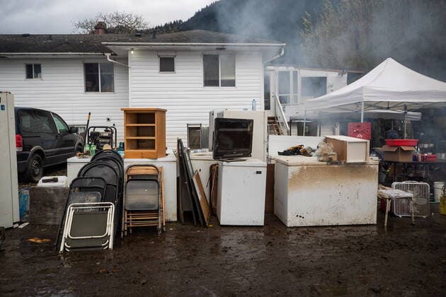 November 23, 2021, ABBOTSFORD, BC, Canada: Freezers and other items a farm manager salvaged from inside the lower floor of a house the family rents on a farm that flooded sit outside, in Abbotsford, B.C., Tuesday, Nov. 23, 2021. ABBOTSFORD Canada  - ZUMAc35_ 20211123_zaf_c35_205 Copyright: xDarrylxDyckx