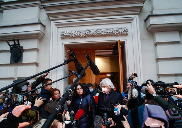 MOSCOW, RUSSIA - NOVEMBER 25, 2021: Lawyer and attorney Henri Reznik (CR) talks to journalists outside the Supreme Court of Russia which heard an application filed by the Russian Prosecutor Generalâ€™s Office to disband Memorial Society, a non-profit international public organisation, which has been declared a foreign agent in Russia, and its subdivisions for violating the â€˜Foreign Agentâ€™ Law. Founded in 1989, the Memorial Society is an international history society researching political repression and monitoring human rights in present-day Russia and other post-Soviet states. The Memorial Society was declared a foreign agent in 2016. Artyom Geodakyan TASS  TS119539