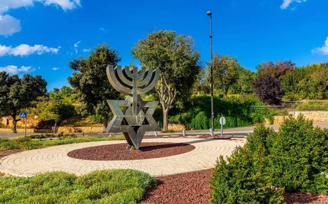 Jerusalem, Israel - October 14, 2017: Yaka square circle with Menorah monument at Rothschild and Kaplan streets aside Knesset in Givat Ram quarter  BEW1DE6F943
