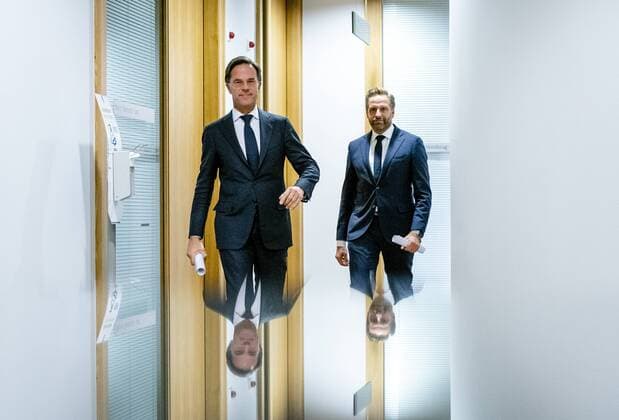 Outgoing Prime Minister Mark Rutte and outgoing Minister Hugo de Jonge (Public Health, Welfare and Sport) after a press conference about stricter corona measures in The Hague, the Netherlands on November 26 2021. ANP BART MAAT Copyright: xANPx xxANPx x441210489x