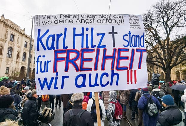 November 28, 2021, Munich, Bavaria, Germany: Despite southern Bavaria being in the clutches of a brutal fourth wave and beingnonnthe cusp of a Delta and Omicron Winter, Corona deniers from throughout Germany banded together without respecting any of the infection control regulations to memorialize disgraced former police officer and conspiracy theorist Karl Hilz who died after being reported by those in his circles as a pneumonia . Since Hilz s death, numerous grifters from the Querdenker scene with little to no connection to him have claimed knowing him and have even tried to raise funds in his name. Munich Germany - ZUMAb160 20211128_zbp_b160_008 Copyright: xSachellexBabbarx