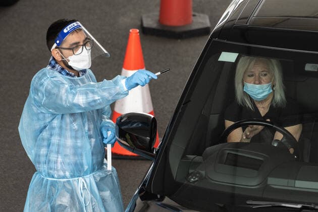NSW COVID19 OMICRON STRAIN, Healthcare workers adminstering COVID-19 tests at a drive through test centre in Sydney, Monday, November 29, 2021. The Omicron COVID-19 variant has arrived in Australia after testing confirmed two overseas travellers who arrived in Sydney were infected with the new strain. ( NO ARCHIVING, EDITORIAL USE ONLY, NO USE IN BOOKS WITHOUT CONSENT SYDNEY NSW AUSTRALIA  Copyright: xJAMESxGOURLEYx 20211129001601234819