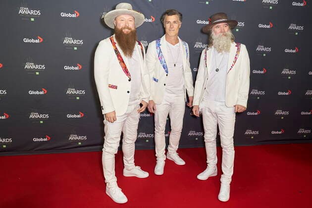 November 29, 2021, London, on, Canada: Chris Duncombe, Aaron Grain and David Roberts of The Washboard Union pose for photographers on the red carpet at the Canadian Country Music Awards in London, Ont., Monday, Nov. 29, 2021. London Canada  - ZUMAc35_ 20211129_zaf_c35_101 Copyright: xGeoffxRobinsx