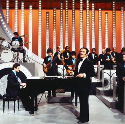 Max Greger Max Greger, deutscher Saxophonist, Big-Band-Leader und Jazz-Musiker, und sein Orchester bei einem Fernsehauftritt, Deutschland 1979. German saxophinist, Big Band Leader and jazz musician Max Greger with his orchestra performing on German TV, Germany 1979., Deutschland Copyright: ArthurxGrimm UnitedArchives82007023 EDITORIAL USE ONLY
