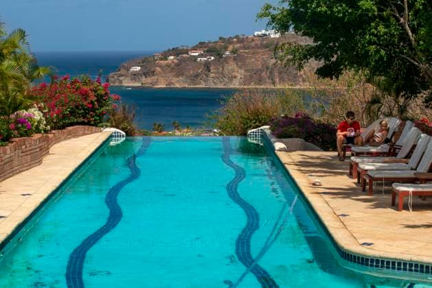 Tourists in the swimming pool of Pelican Eyes Resort and Spa in Playa San Juan del Sur beach Nicaragua Central America Nicaragua Copyright: xSergixReboredox xVWPicsx SRE-032-CY0423