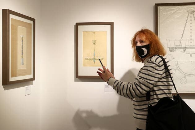 MOSCOW, RUSSIA â€“ DECEMBER 6, 2021: A woman visits an exhibition titled The History of Russian Design â€“ The Best of 1917-2022 and held at the New Tretyakov Gallery, the first to feature a vast collection of the Moscow Design Museum. Artyom Geodakyan TASS  TS11AE23