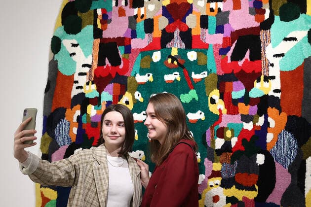 MOSCOW, RUSSIA â€“ DECEMBER 6, 2021: Women visit an exhibition titled The History of Russian Design â€“ The Best of 1917-2022 and held at the New Tretyakov Gallery, the first to feature a vast collection of the Moscow Design Museum. Artyom Geodakyan TASS  TS11AE38