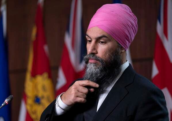 December 7, 2021, Ottawa, ON, Canada: New Democratic Party leader Jagmeet Singh listens to a question during a news conference, Tuesday, Dec. 7, 2021 in Ottawa. Ottawa Canada  - ZUMAc35_ 20211207_zaf_c35_005 Copyright: xAdrianxWyldx