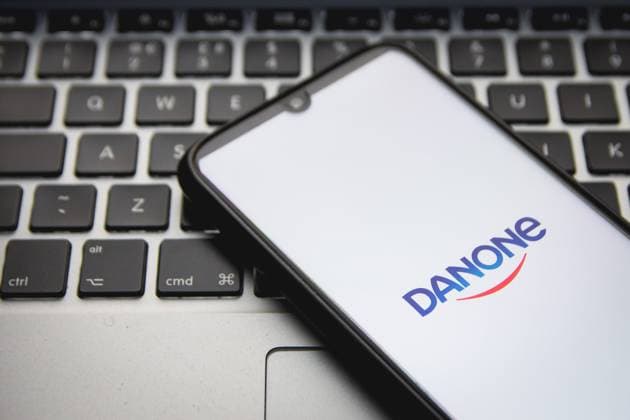 Logo Photo Illustration In this photo illustration a Danone logo seen displayed on a smartphone screen with a computer keyword in the background in Athens, Greece on December 9, 2021. Athens Greece  Copyright: xNikolasxKokovlisx originalFilename:kokovlis-notitle211209_npPrt.jpg