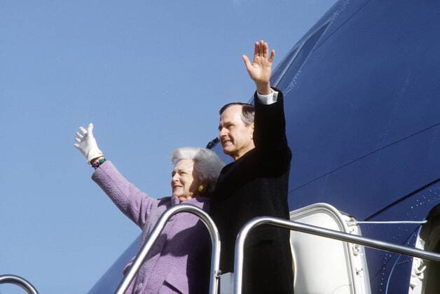 Inauguration a final farewell - former President and First Lady George and Barbara Bush give one final goodbye wave prior to boarding Air Force One. Approximately 600 well wishes were present for the departure at Andrew Air Force Base, Maryland on Inauguration day. 1062_05_L_-9236-