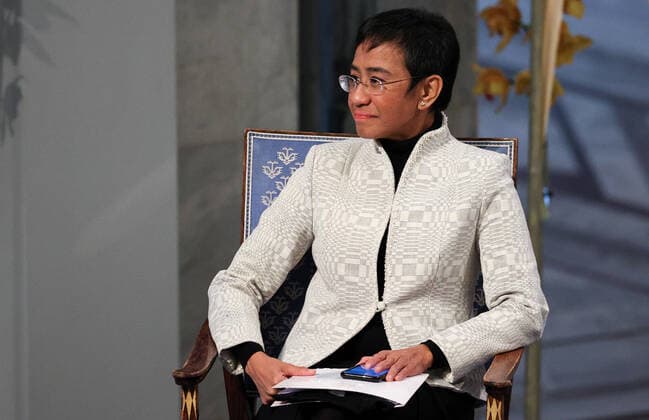 OSLO, NORWAY â€“ DECEMBER 10, 2021: Filipino-American journalist co-founder and CEO of Rappler Maria Ressa is seen during the 2021 Nobel Peace Prize award ceremony at Oslo City Hall. The Norwegian Nobel Committee has decided to award the Nobel Peace Prize for 2021 to Philipino-American journalist Maria Ressa and Russian journalist Dmitry Muratov in recognition of their efforts to safeguard freedom of expression, which is a precondition for democracy and lasting peace . Sergei Bobylev TASS  TS11B5C7