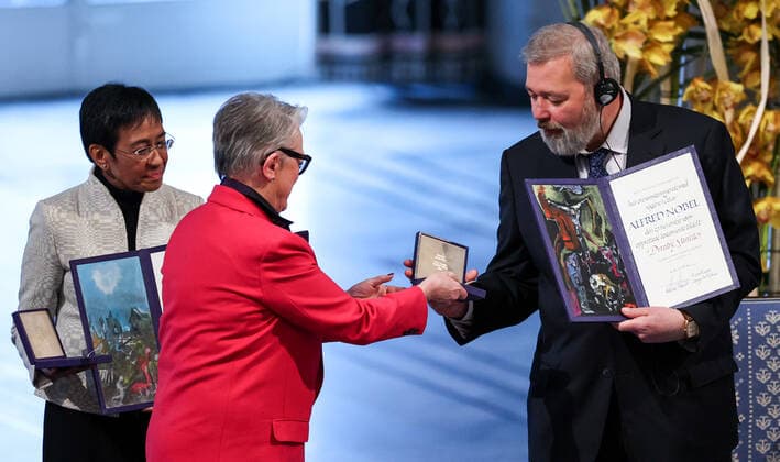 OSLO, NORWAY â€“ DECEMBER 10, 2021: Norwegian Nobel Committee Chairwoman Berit Reiss-Andersen (L front) presents the 2021 Nobel Peace Prize to Filipino-American journalist, co-founder and CEO of Rappler Maria Ressa (L back) and Russian journalist, Novaya Gazeta editor-in-chief Dmitry Muratov in recognition of their efforts to safeguard freedom of expression, which is a precondition for democracy and lasting peace , at a ceremony at Oslo City Hall. Sergei Bobylev TASS  TS11B5E3