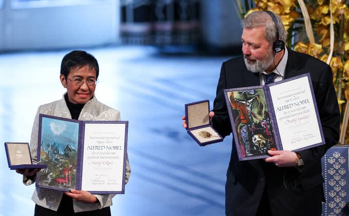 OSLO, NORWAY â€“ DECEMBER 10, 2021: Filipino-American journalist, co-founder and CEO of Rappler Maria Ressa (L) and Russian journalist, Novaya Gazeta editor-in-chief Dmitry Muratov are awarded the 2021 Nobel Peace Prize in recognition of their efforts to safeguard freedom of expression, which is a precondition for democracy and lasting peace , at a ceremony at Oslo City Hall. Sergei Bobylev TASS  TS11B600