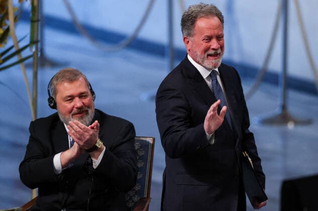 OSLO, NORWAY â€“ DECEMBER 10, 2021: 2021 Nobel Peace Prize winner, Russian journalist, Novaya Gazeta editor-in-chief Dmitry Muratov (L) and 2020 Nobel Peace Prize winner, World Food Programme Executive Director David Beasley are seen during the 2021 Nobel Peace Prize award ceremony at Oslo City Hall. The Norwegian Nobel Committee has decided to award the Nobel Peace Prize for 2021 to Maria Ressa and Dmitry Muratov in recognition of their efforts to safeguard freedom of expression, which is a precondition for democracy and lasting peace . Sergei Bobylev TASS  TS11B5F7