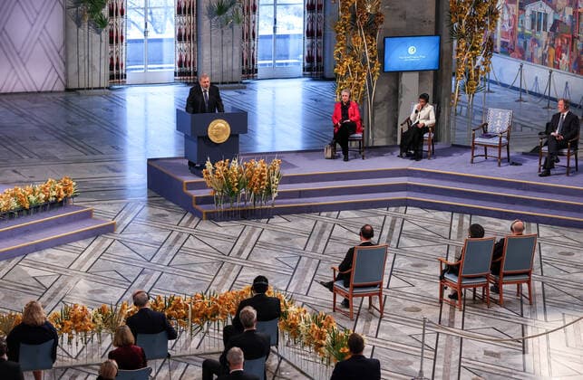 OSLO, NORWAY â€“ DECEMBER 10, 2021: 2021 Nobel Peace Prize winner, Russian journalist, Novaya Gazeta editor-in-chief Dmitry Muratov (C back) delivers a Nobel lecture at the 2021 Nobel Peace Prize award ceremony at Oslo City Hall. The Norwegian Nobel Committee has decided to award the Nobel Peace Prize for 2021 to Maria Ressa and Dmitry Muratov in recognition of their efforts to safeguard freedom of expression, which is a precondition for democracy and lasting peace . Sergei Bobylev TASS  TS11B60D