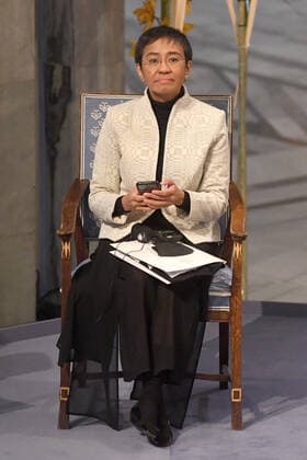 Philippine journalist Maria Ressa and Russian journalist Dmitry Muratov receive their Nobel Peace Prize for their courageous fight for freedom of expression in the face of authoritarian governments during the Nobel Peace Prize Award Ceremony 2021 at the Oslo City Town Hall in Norway. Both have been subject to threats for their reporting on human rights abuses and corruption carried out by the governments of Philippine President Rodrigo Duterte and Russian President Vladimir Putin respectively. DECEMBER 10th 2021  RHDx21651