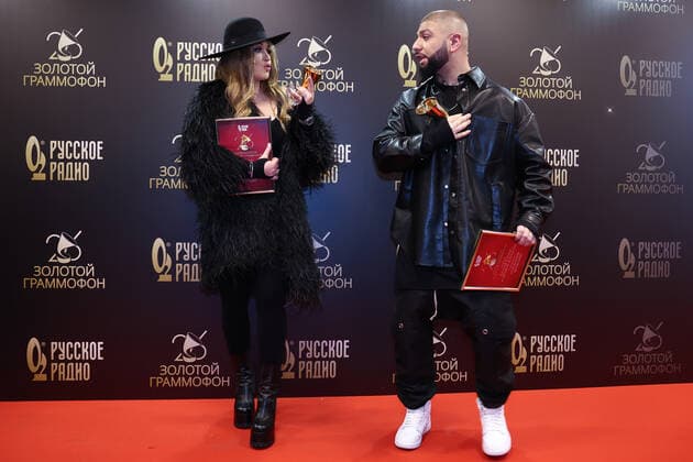 MOSCOW, RUSSIA - DECEMBER 10, 2021: Singers Irina Dubtsova and Artem Kacher attend the 2021 Golden Gramophone Awards ceremony at the State Kremlin Palace. Valery Sharifulin TASS  TS11B6B5