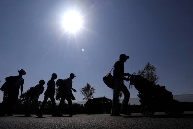 A group of migrants walk by the municipality of San Martín Texmelucan, on the Puebla-Mexico highway in Mexico, 10 December 2021. The migrant caravan plans to arrive in Mexico City this Friday night or Saturday morning after a last stop in the state of Puebla, where they are moving by road despite the impact of the accident in the south that killed more than 50 migrants. EFE Hilda Ríos Migrant caravan will arrive in Mexico City after last stop in Puebla !ACHTUNG: NUR REDAKTIONELLE NUTZUNG!  Copyright: xHildaxRíosx MEX139 20211210-1f48ce7862dd474612c0e4ded3a415e0ddca2715