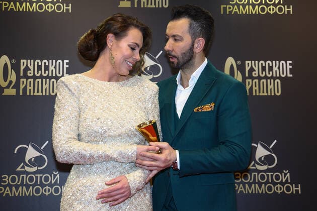 MOSCOW, RUSSIA - DECEMBER 10, 2021: Singer Denis Klyaver and his wife Irina attend the 2021 Golden Gramophone Awards ceremony at the State Kremlin Palace. Valery Sharifulin TASS  TS11B6E8