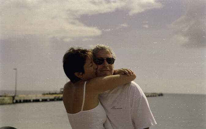 December 10, 2021: The US attorney s office has released images during the trial of Ghislaine Maxwell, 59, who faces six federal charges relating to accusations in the sexual exploitation of girls with sex offender Jeffrey Epstein. The photos, entered into evidence on Tuesday, December 7, 2021 were recovered during an FBI raid at Epstein s Upper East Side mansion in 2019, an FBI analyst testified. UNDATED FILE PICTURE: GHISLAINE MAXWELL kisses JEFFREY EPSTEIN share an embrace. New York USA - ZUMAz03_ 20211210_new_z03_057 Copyright: xUSxAttorneyxOfficex